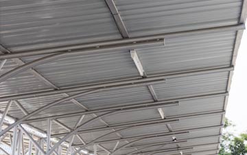 installing New Fryston metal roofing